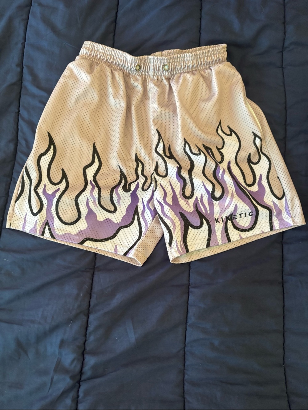 Kinetic Men’s Beige Athletic Shorts with Purple Flame Detail